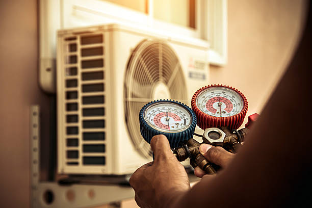 Professional Heat Pump Repair technician working in Martell, CA